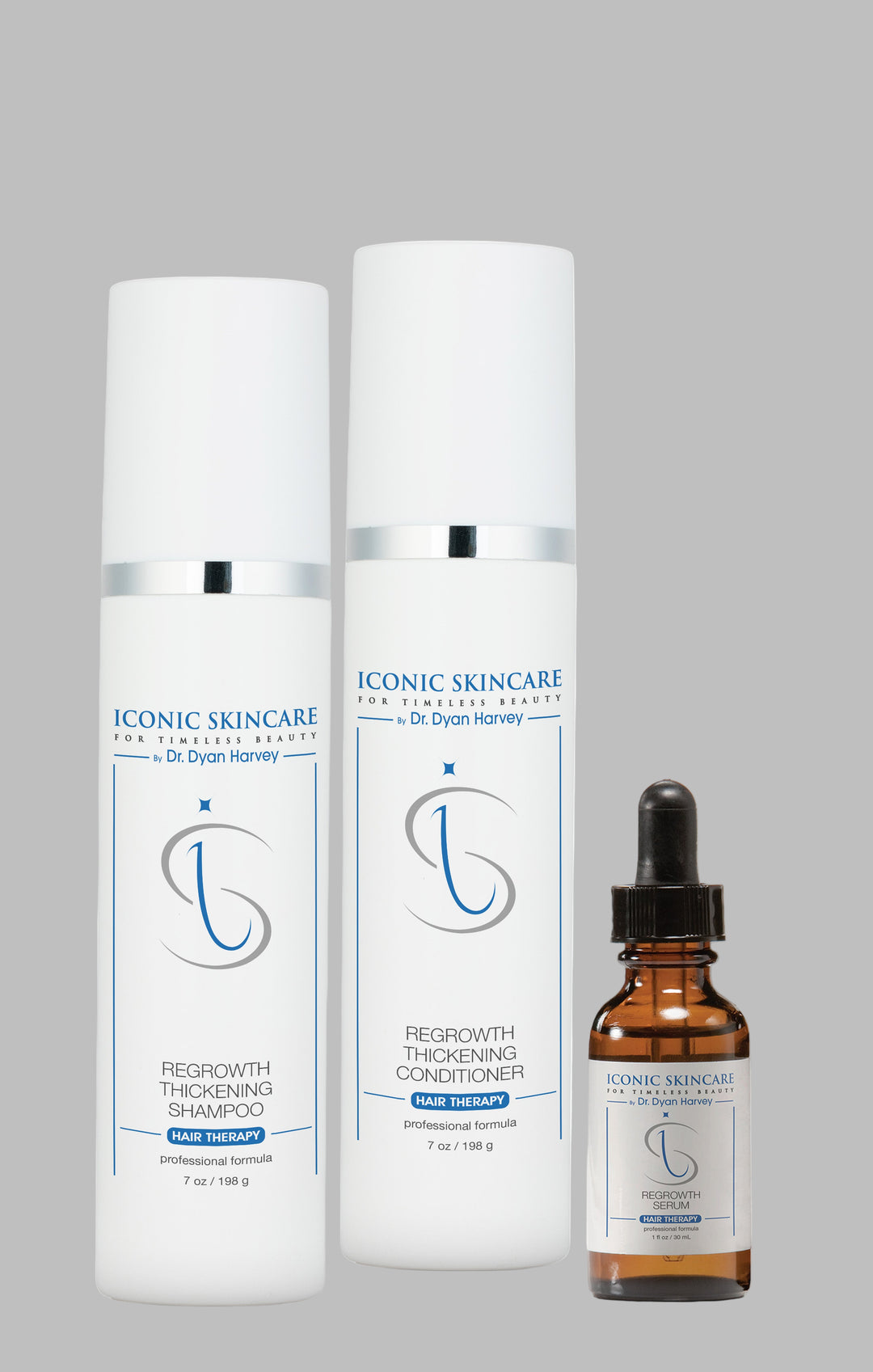 Hair Regrowth system image Iconic Skincare hair care including shampoo, conditioner, and serum on a white background